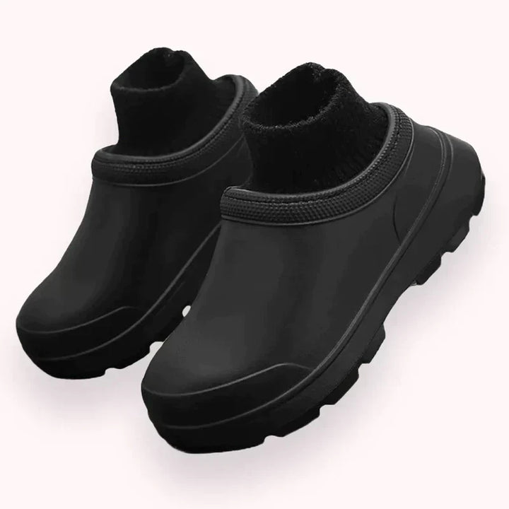 Easy slip-on women's clogs featuring a knitted ankle cuff. Great for casual, everyday wear.
