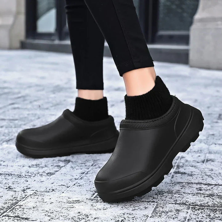 Women's comfortable slip-on platform clogs with secure knit ankle cuff. Casual & non-slip design.