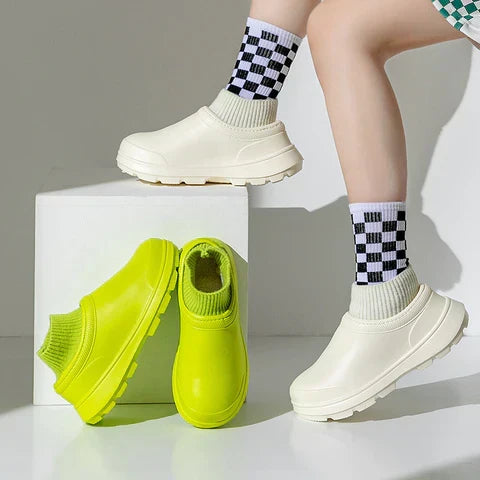 Versatile women's slip-on clogs with knit ankle cuff. Comfortable, non-slip, and easy to wear.