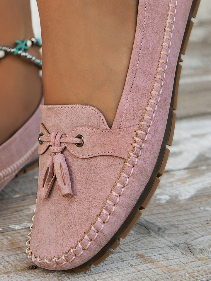Durable & comfortable women's loafers, slip-on with cushioned support for lasting comfort.