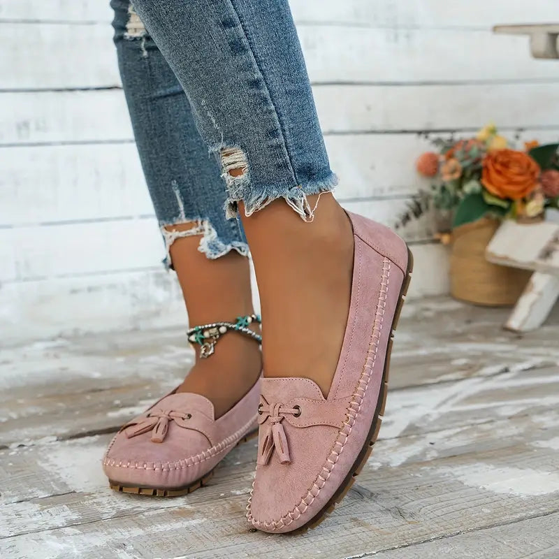 Comfortable ladies' loafers, slip-on design with cushioned support for everyday wear.