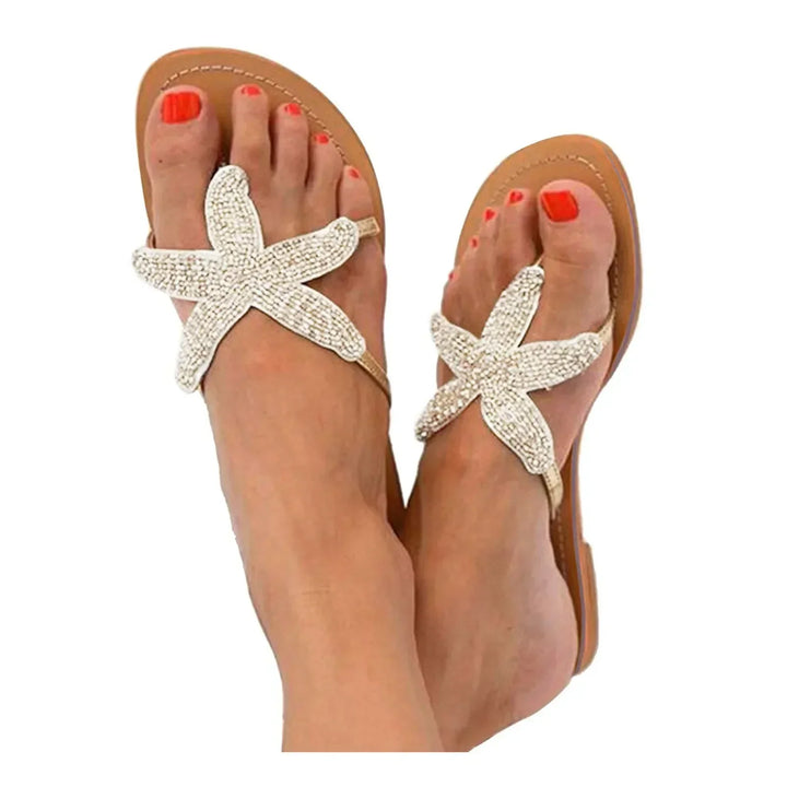 Stylish open-toe flat slide sandals for women, ideal as beach slides or vacation footwear.