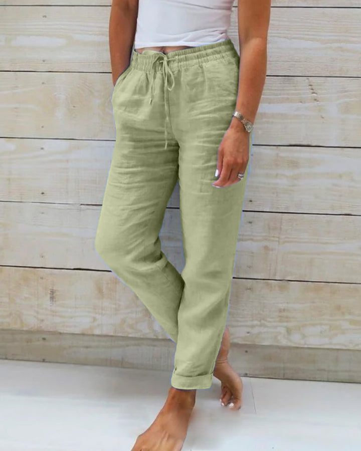 Comfortable women's straight leg pants with a secure drawstring and elastic waist, perfect for everyday relaxed style.