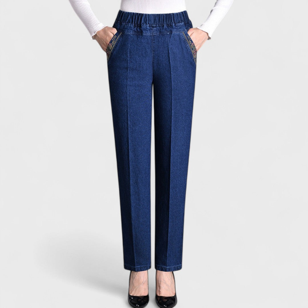 Casual women's stretch denim jeans with a comfortable elastic waist, perfect for everyday style.