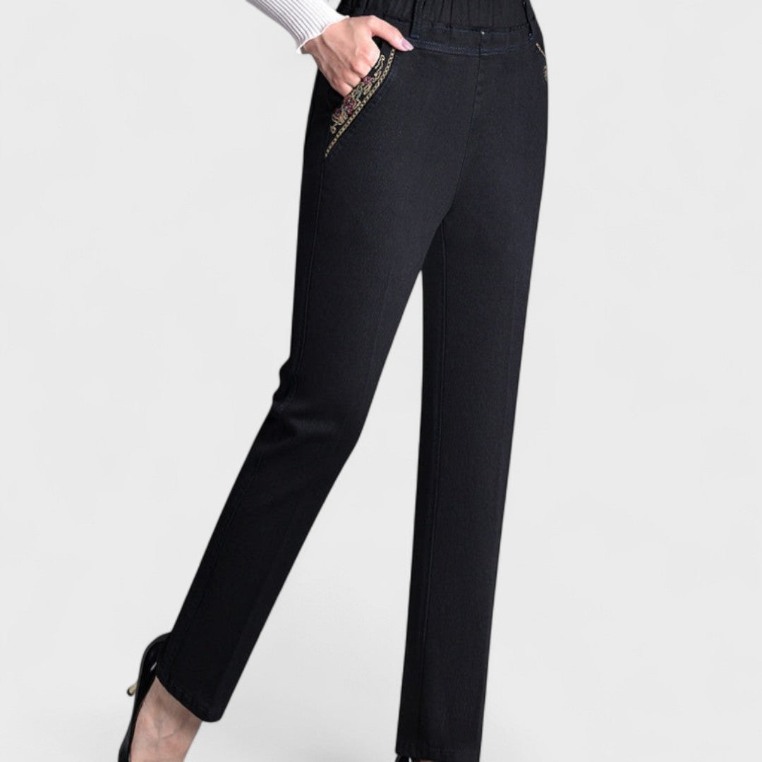 Comfy women's stretch jeans, elastic waist for easy fit, with side pockets, great for daily wear.