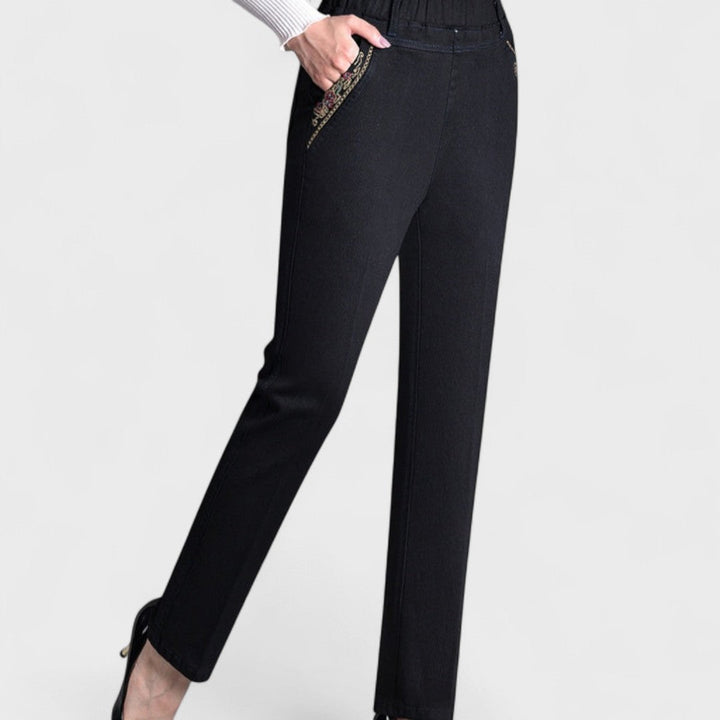 Comfy women's stretch jeans, elastic waist for easy fit, with side pockets, great for daily wear.