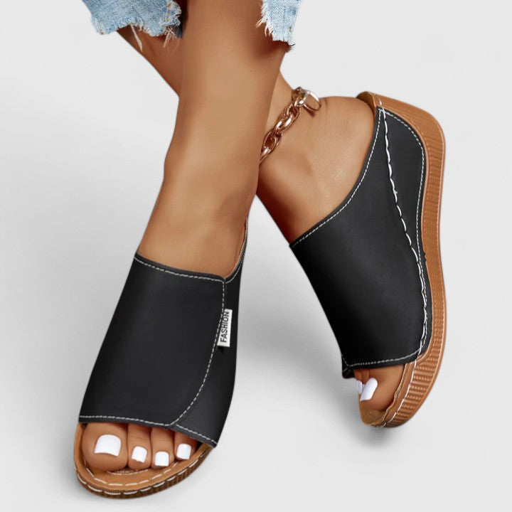 Lightweight open-toe women's flats, offering comfort for summer walking & travel.