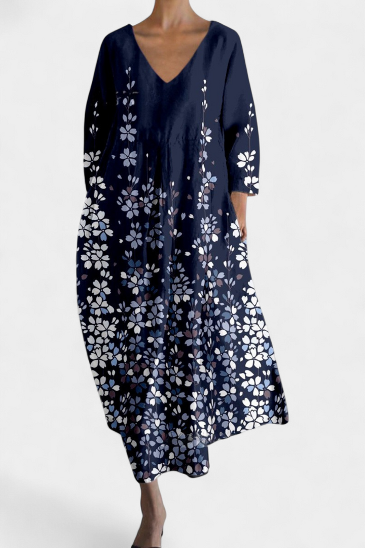 Relaxed fit women's flowy maxi dress, featuring a comfortable V-neck. A must-have for casual spring/summer.