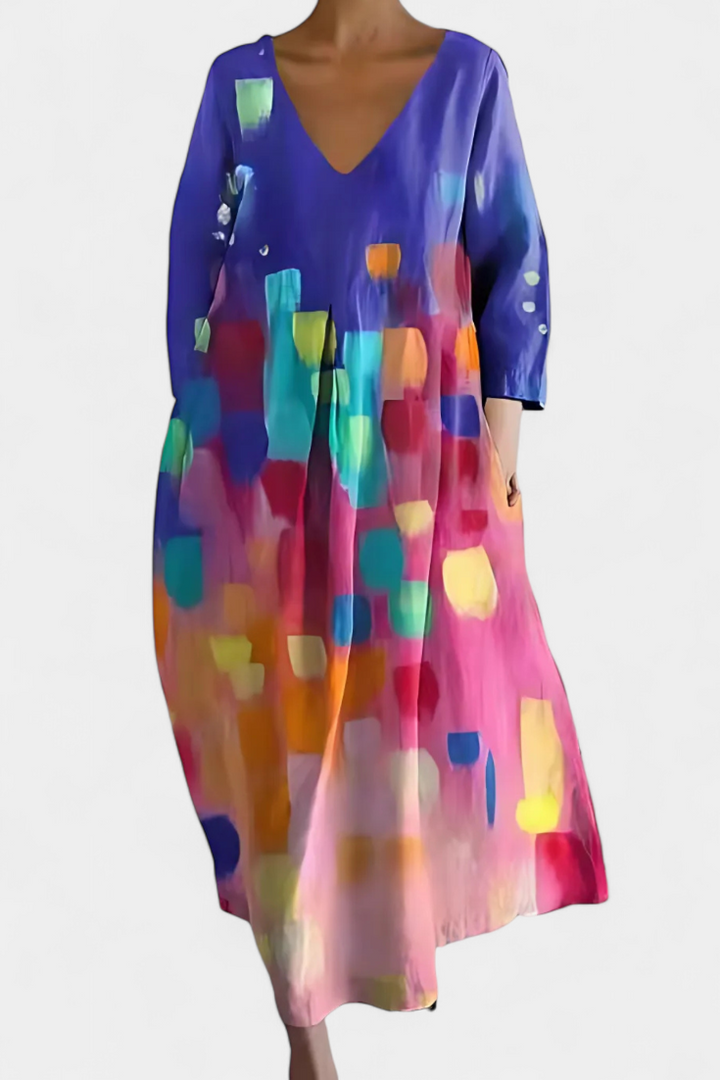 Vacation-ready women's maxi dress with a comfortable V-neck and elegant flowy fabric. Summer essential.