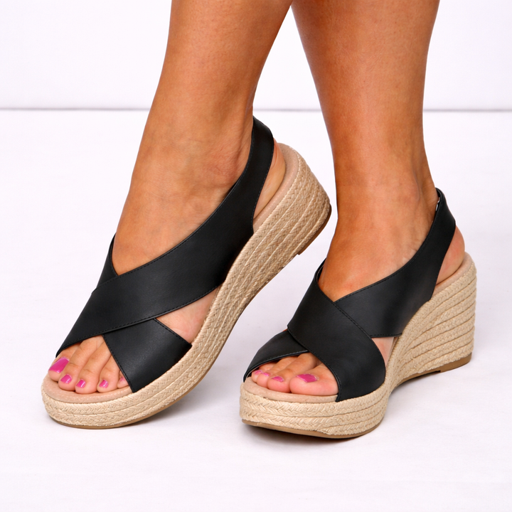 Women's comfortable wedge sandals featuring stylish crossover straps, perfect for daily wear & summer.