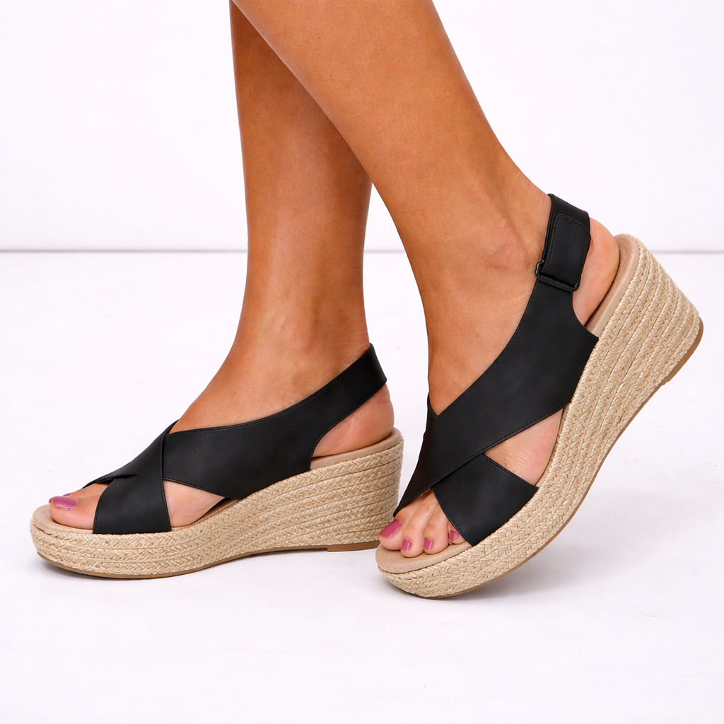 Comfortable women's wedge sandals with fashionable crossover straps & stable platform, ideal summer footwear.