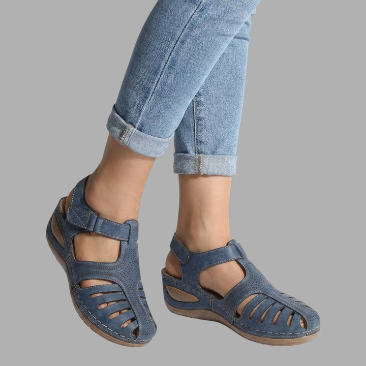 Chic open-toe women's wedge sandals with breathable straps, ideal for casual summer outfits & comfort.