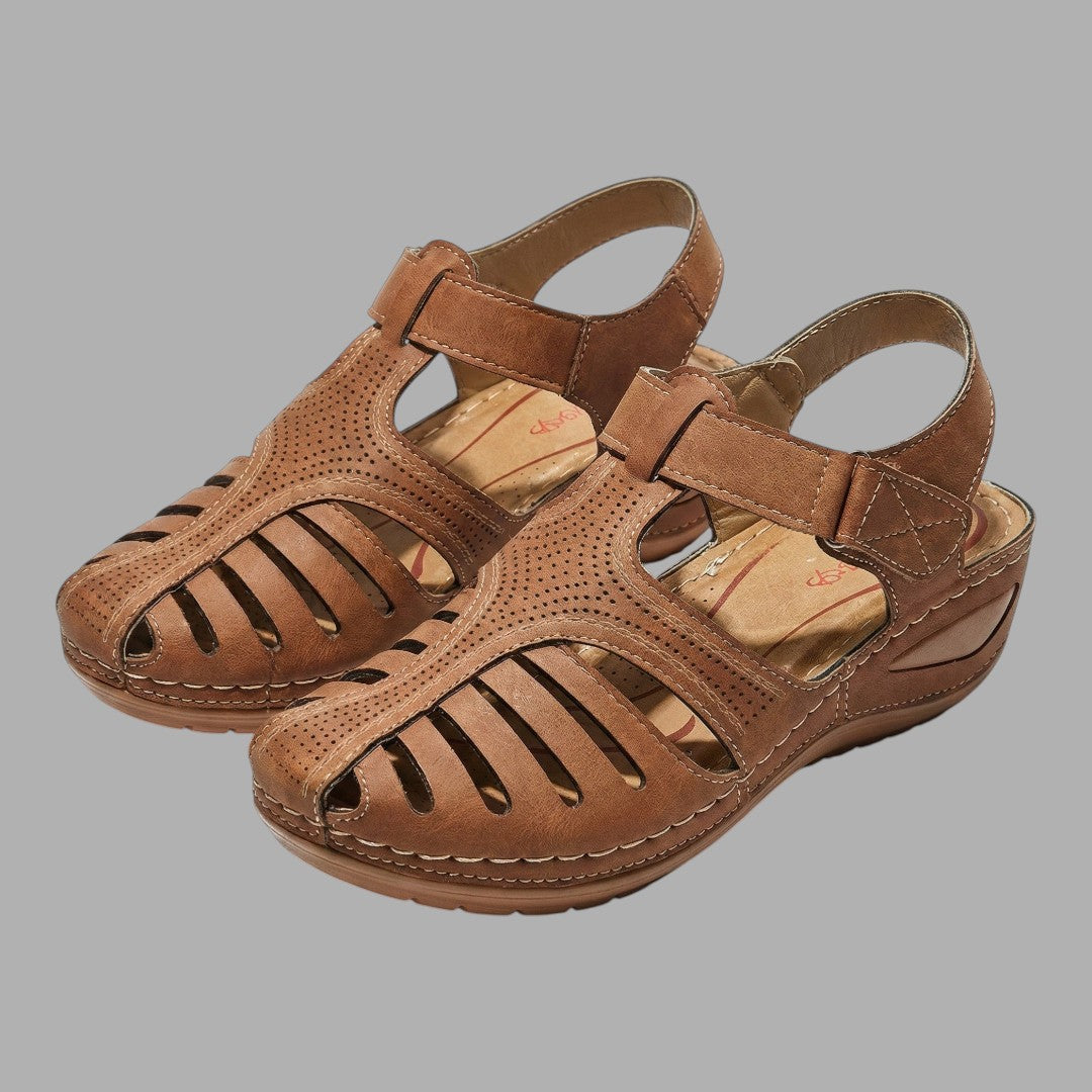 Supportive women's wedge sandals with cushioned footbed, ensuring comfort for long summer walks & everyday wear.