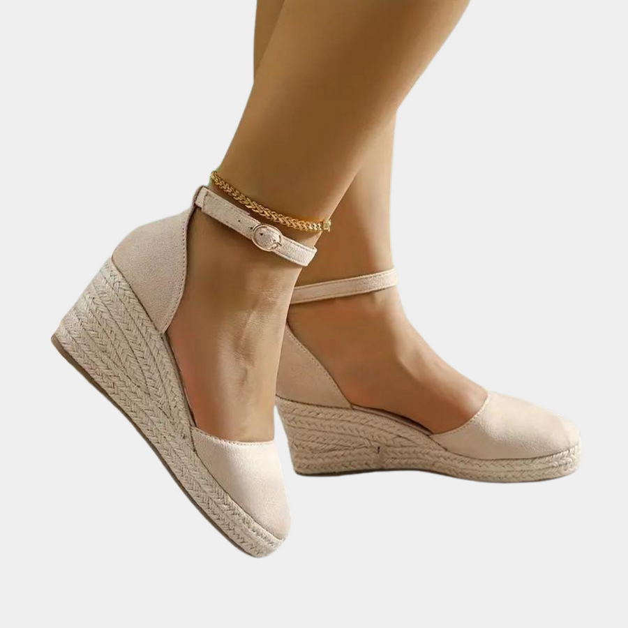 Women's comfortable wedge sandals with adjustable ankle strap for all-day wear & summer style.