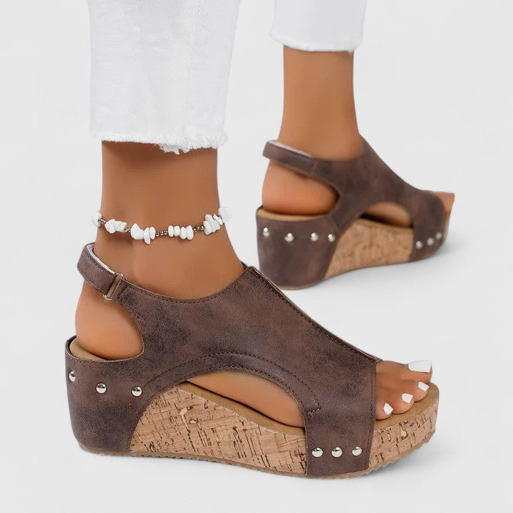 Comfortable women's arch support wedge sandals in a neutral tone, ideal for casual summer outfits.