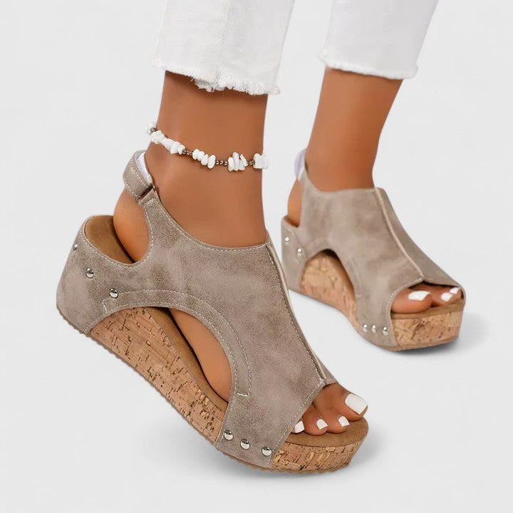 Fashionable women's wedge sandals offering superior arch support and comfort for all-day wear.