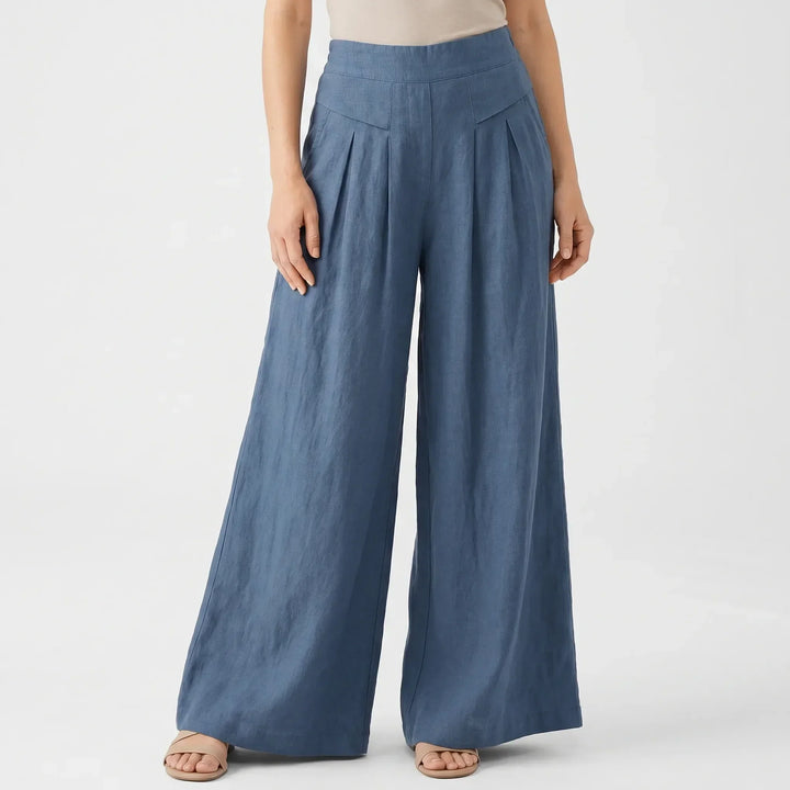 High-waisted wide leg summer pants for women with an elastic waist, offering comfortable, relaxed fit. Casual fashion.
