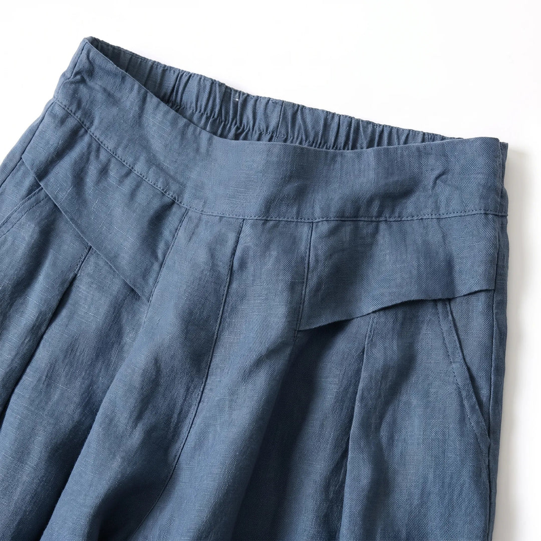 Pleated wide leg summer pants for women, featuring a comfortable loose fit & high elastic waist. Relaxed casual style.