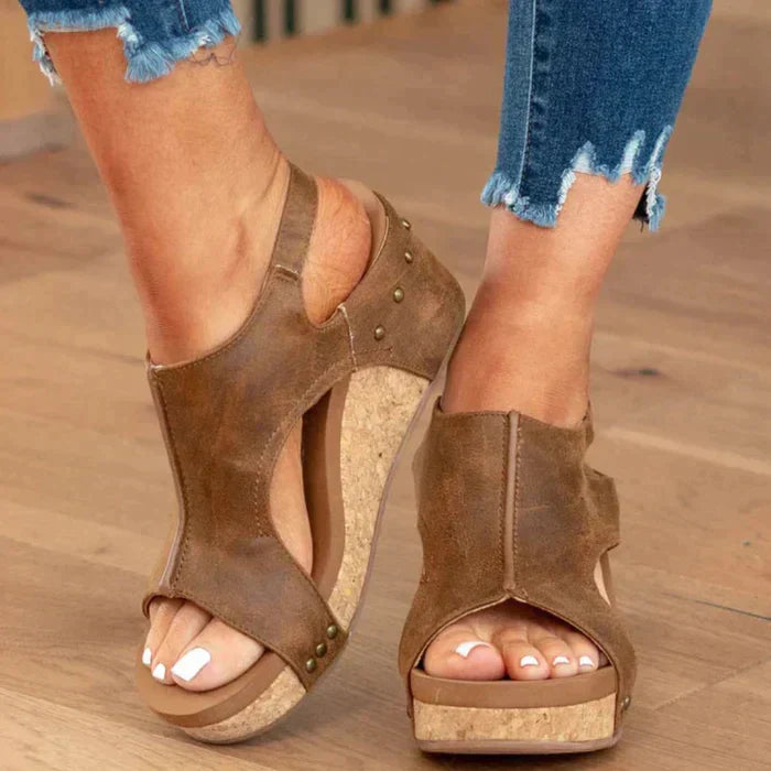 Supportive women's wedge sandals with orthopedic design, arch support, and adjustable straps for comfort.