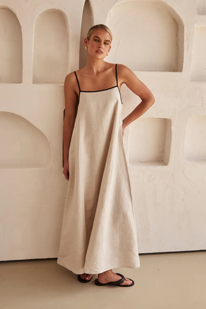 Chic oversized maxi dress with square neck & contrast trim, spaghetti straps. Perfect for summer casual.