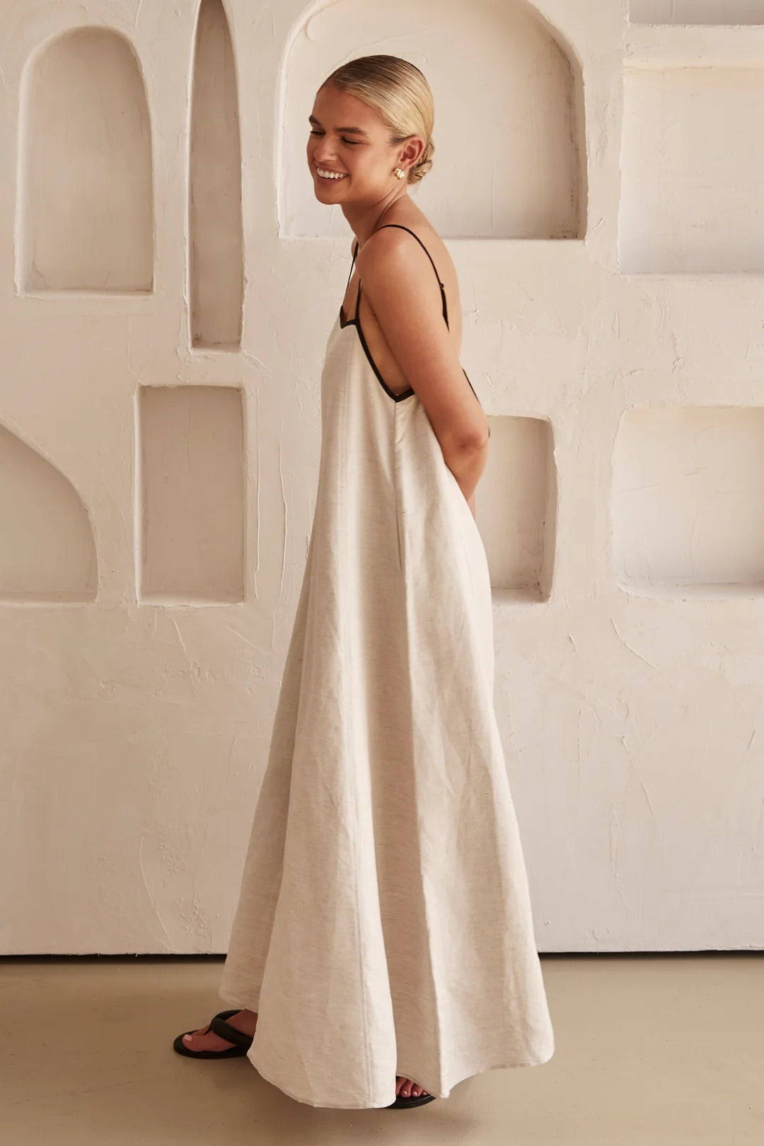 Casual elegant women's maxi dress, spaghetti straps, square neck, and distinctive contrast trim detail.