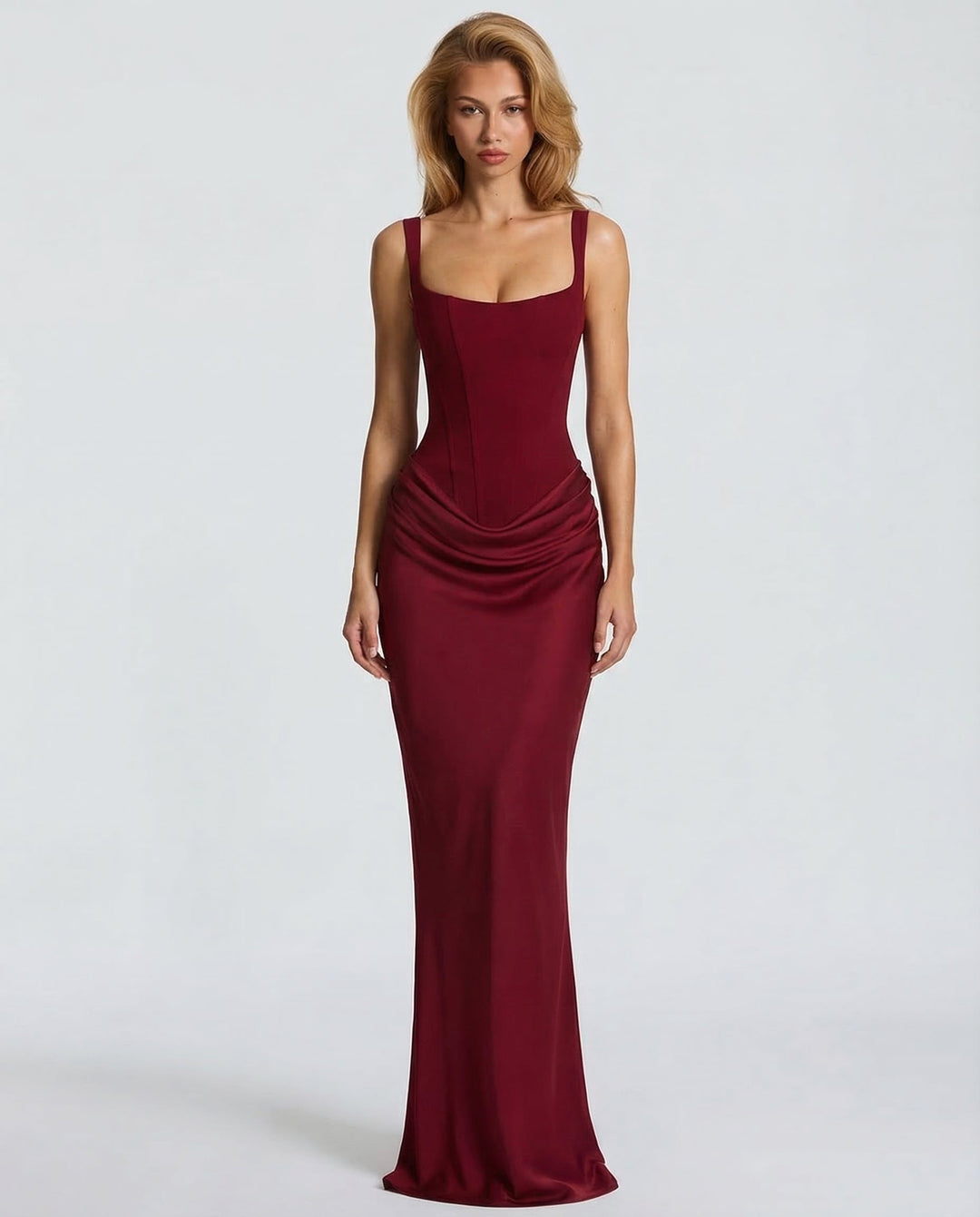 Formal women's corset maxi dress with a sleek sculpted silhouette, elegant draped waist, and square neck design.