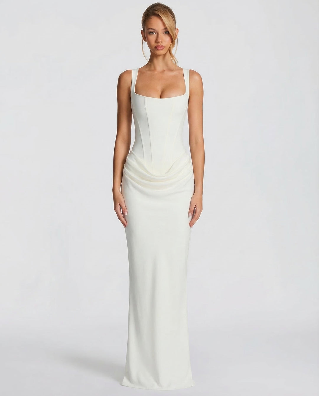 Sophisticated women's maxi corset dress, featuring a sculpted silhouette and draped waist. Perfect elegant evening wear.