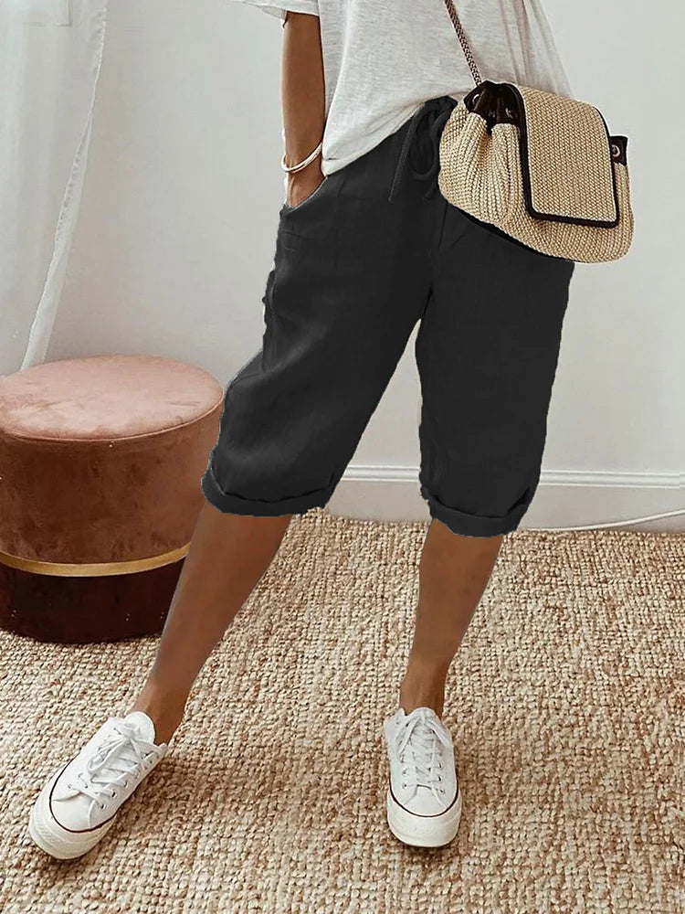 Women's cotton capri pants with drawstring waist, perfect for casual summer wear & comfort.