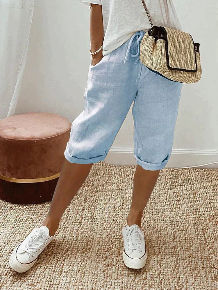 Stylish women's drawstring cotton capri pants in a relaxed fit, ideal for comfortable casual summer outfits.