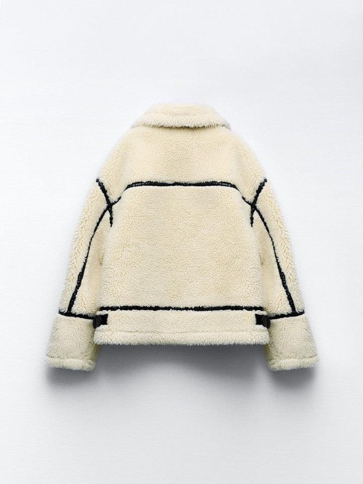 Warm women's aviator jacket with cozy lining, ideal winter outerwear for chic, comfortable layering.