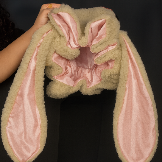 Stylish women's bunny bonnet, a cute & cozy gift idea, provides warmth & hair protection, soft plush material.
