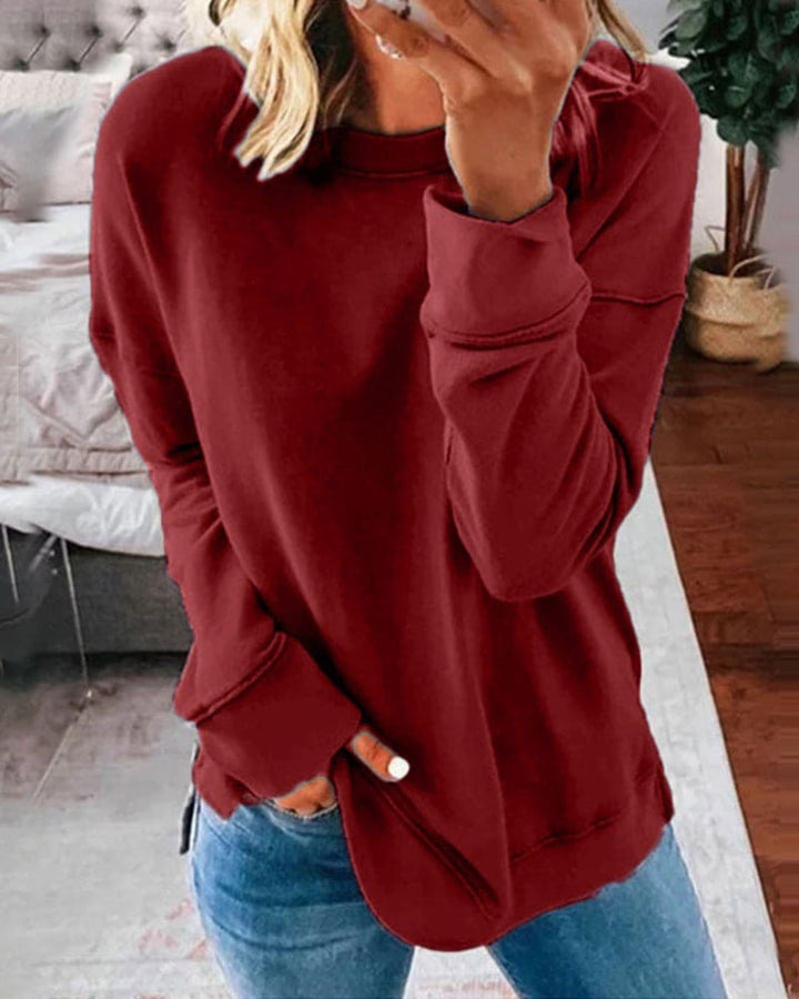 Stylish women's classic crewneck sweatshirt, ideal for cozy everyday comfort & casual fashion.