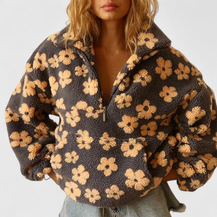 Women's cozy floral quarter-zip pullover sweater, perfect for autumn casual style.