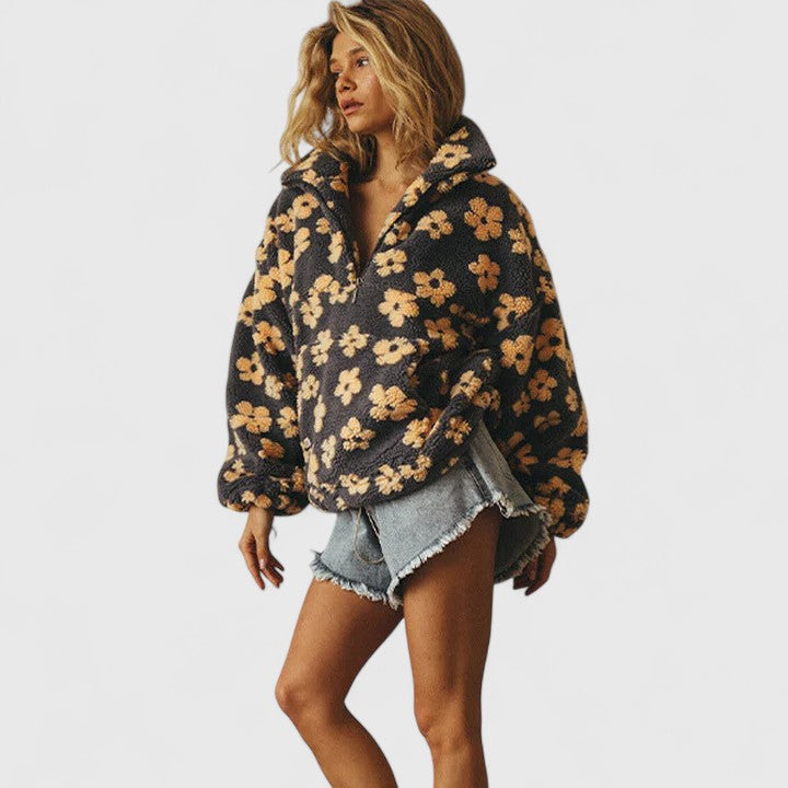 Comfortable women's floral knit sweater, a quarter-zip casual top for winter fashion.