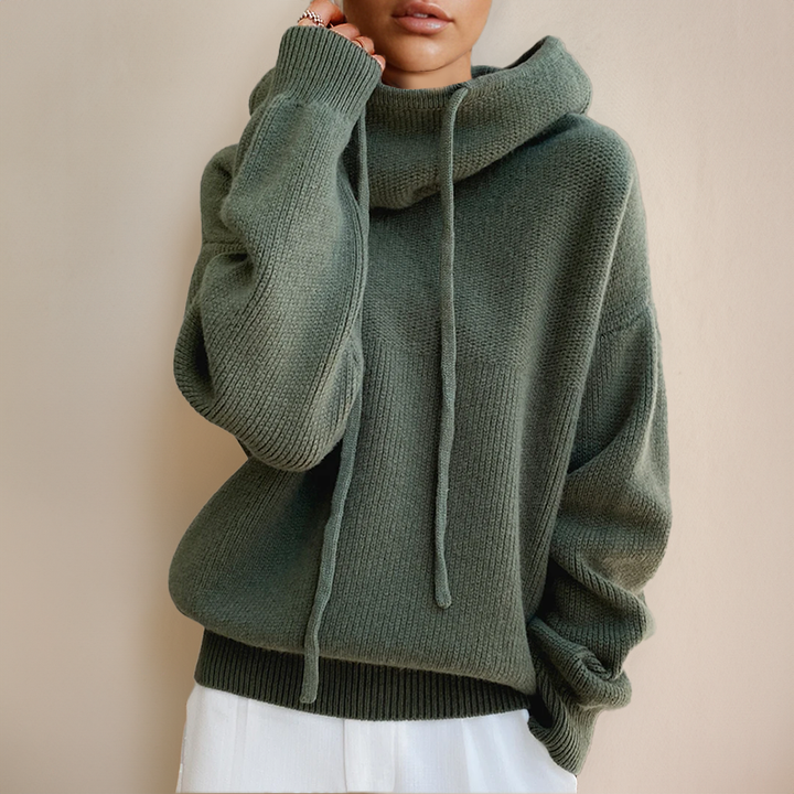 Women's cozy high neck pullover sweater in soft knit, perfect for warm winter fashion and comfort.