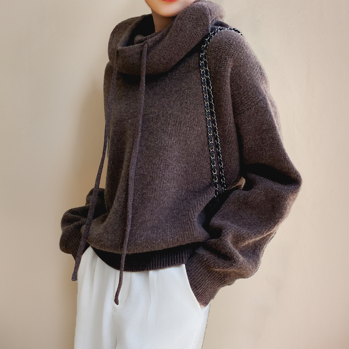 Comfortable women's high neck sweater, a stylish and warm pullover for cold season fashion and elegance.