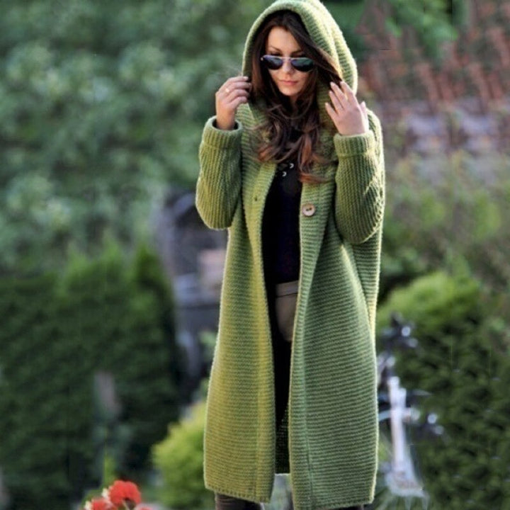 Soft women's hooded knit cardigan, offering warmth & style. Perfect cozy outerwear for chilly days.