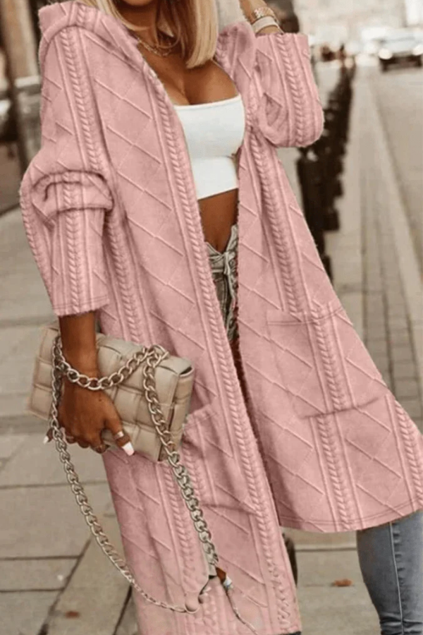 Relaxed fit women's hooded sweater, ideal for versatile fall fashion and winter wear.