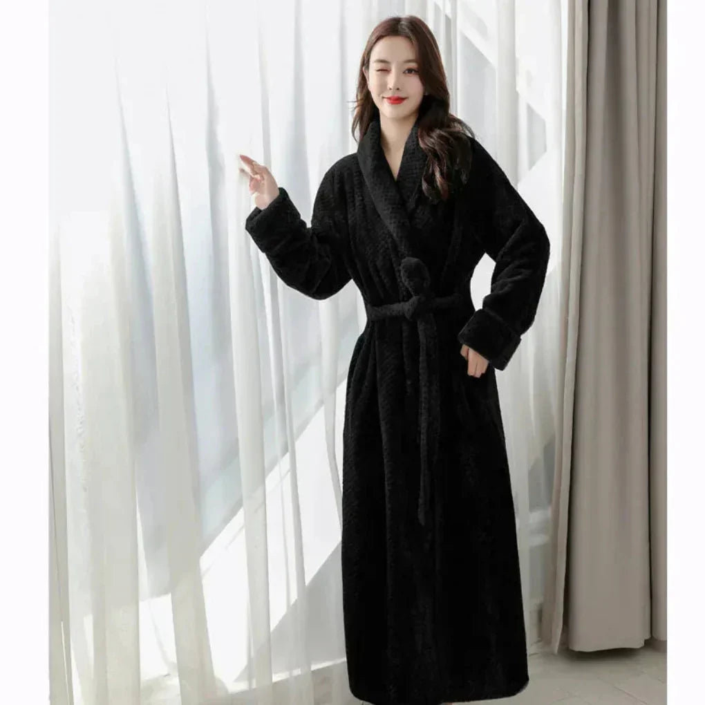 Elegant women's hooded plush robe, a cozy loungewear essential for luxurious relaxation at home.