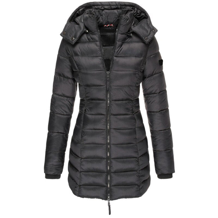 Cozy women's hooded winter coat, insulated for everyday warmth, perfect for chilly casual outings.