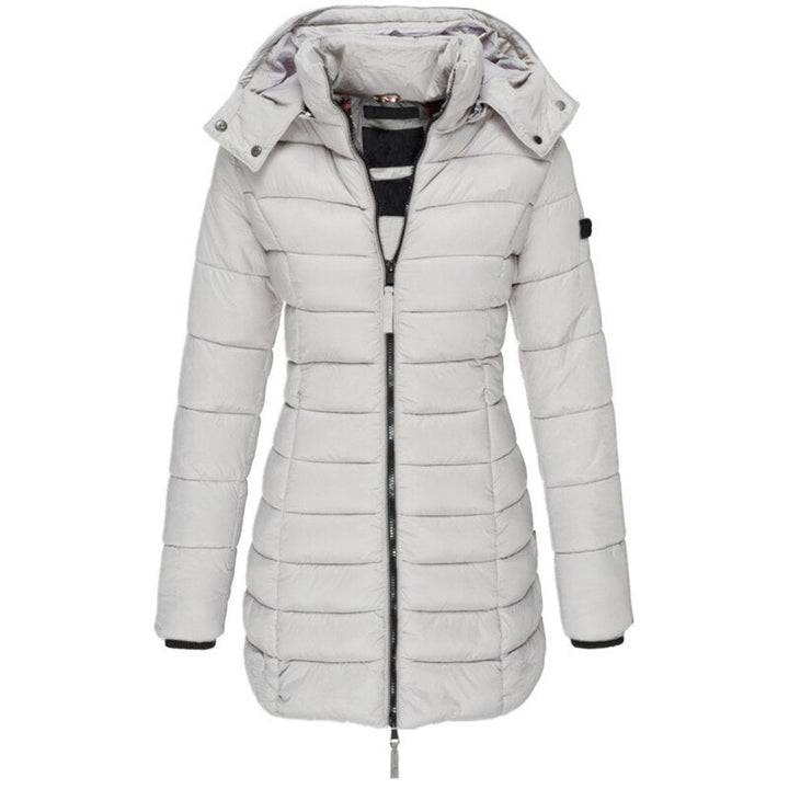 Functional women's insulated hooded jacket, designed for warmth and comfort in severe winter conditions.