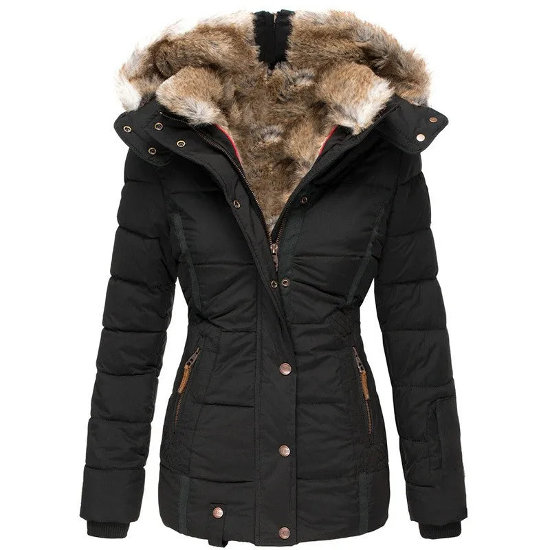 Stylish women's blue insulated winter jacket. Cozy, warm outerwear for extreme cold weather protection.