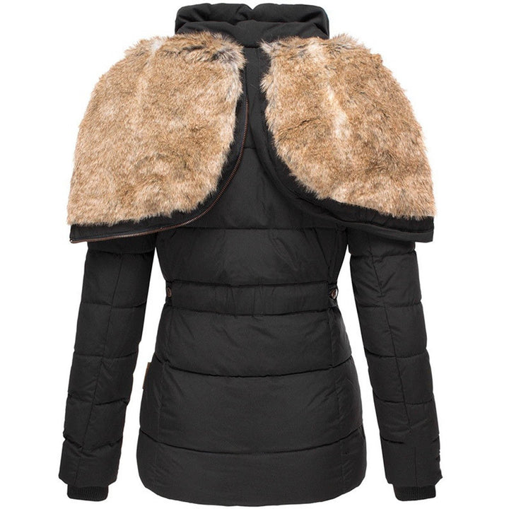 Red women's cozy insulated winter jacket. Stylish, warm outerwear for extreme cold weather comfort.