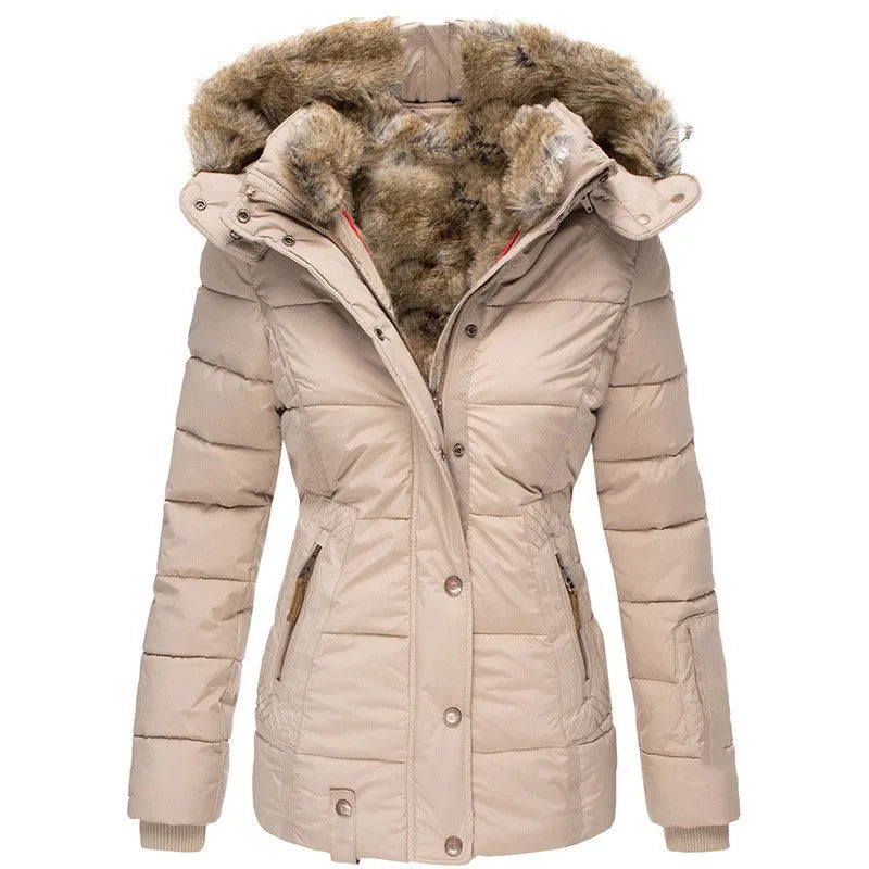Green women's insulated winter coat. Warm, cozy outerwear for extreme cold. Essential winter fashion.