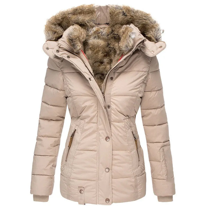 Green women's insulated winter coat. Warm, cozy outerwear for extreme cold. Essential winter fashion.