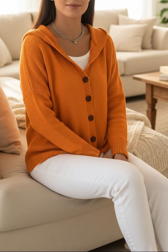 Soft women's hooded cardigan, a cozy knitwear piece for ultimate comfort in fall/winter.