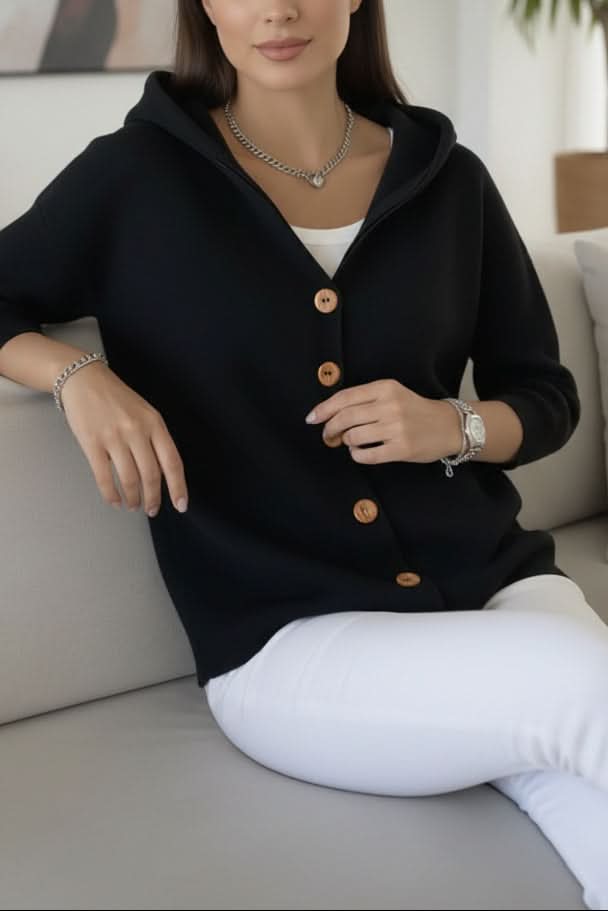 Women's relaxed fit hooded sweater, perfect casual top & layering piece for any day.