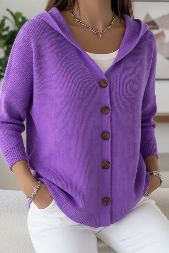 Cozy hooded women's cardigan, a soft knitwear choice for comfortable fall and winter outfits.