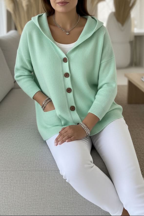 Women's fashionable hooded cardigan, a relaxed fit layering piece for everyday coziness.