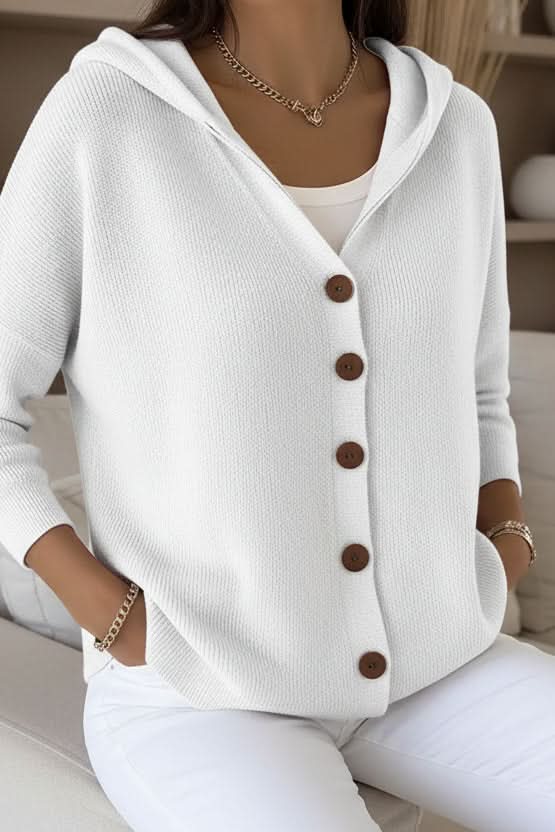 Effortless women's hooded sweater, perfect cozy knitwear for casual fall fashion.